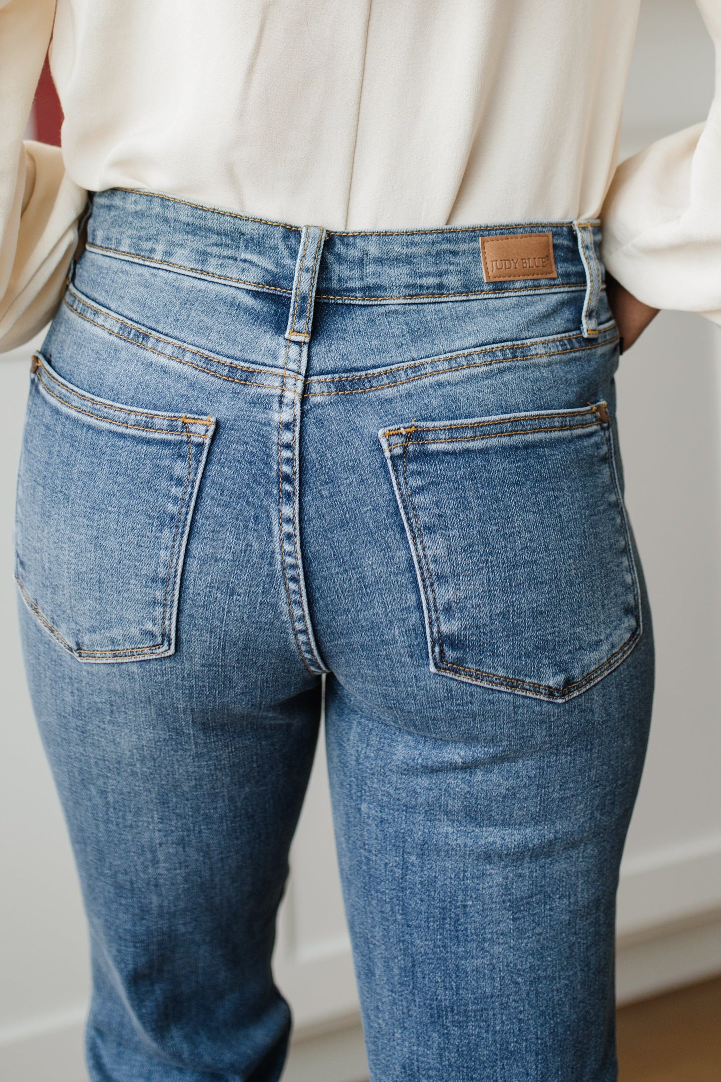 Midrise Destructed Hem Slim Fit Jeans